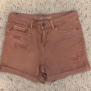 Midi rise ripped jean shorts